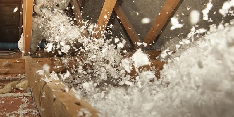 Photo isolation par soufflerie de ouate de cellulose